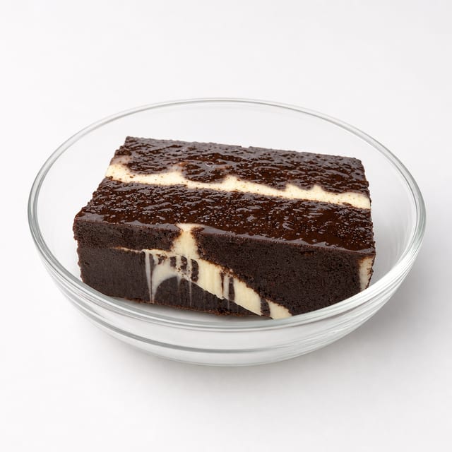 Tuxed Chocolate Mousse Cake Slice.