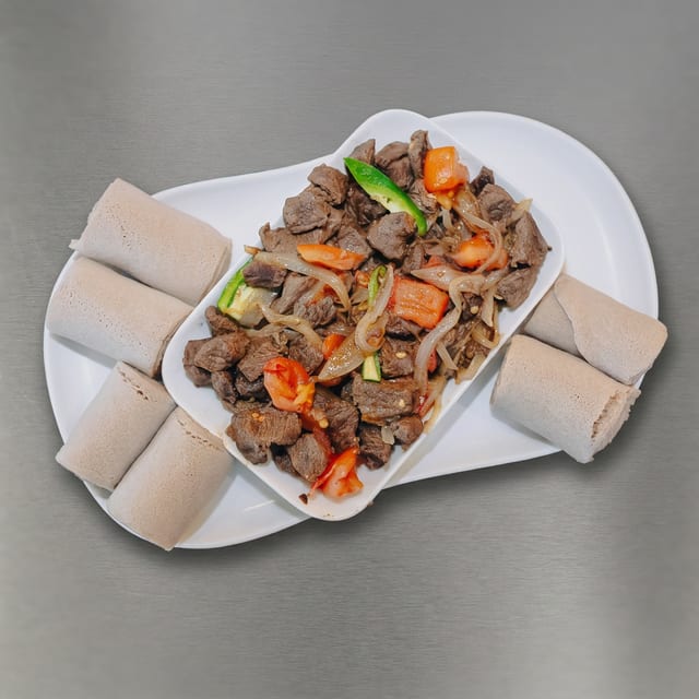 8. Ye-Beg Tibs (Lamb).