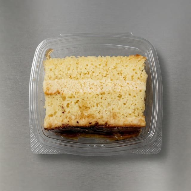 Caramel Tres Leches Bar Cake Slice.